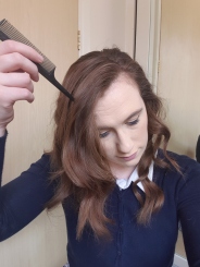 Sectioning hair for barrel roll